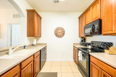 Kitchen with dishwasher, stove, micro, fridge w/ice & water, coffee maker, etc