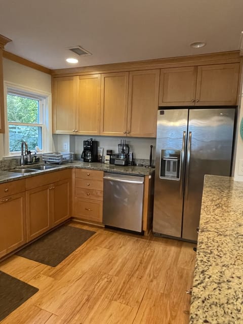Kitchen's dishwasher and refrigerator.