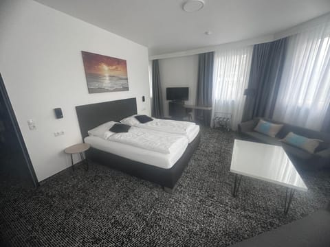 Family Triple Room, Multiple Beds, River View | In-room safe, desk, laptop workspace, free WiFi