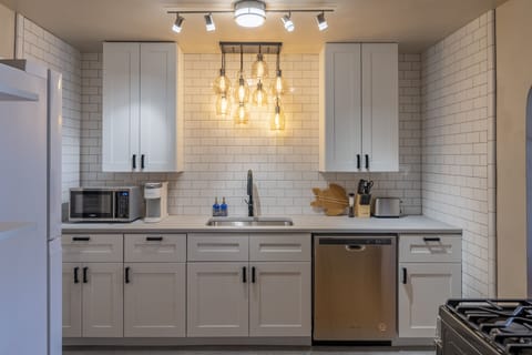 Fully stocked kitchen with all new appliances and microwave and kuerig. 