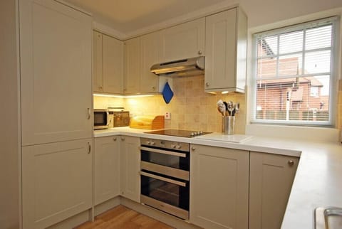 Fridge, dishwasher, cookware/dishes/utensils