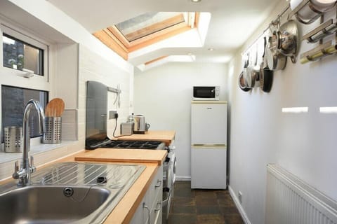 Fridge, dishwasher, cookware/dishes/utensils