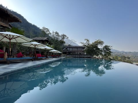 Outdoor pool, pool umbrellas, sun loungers