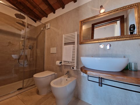 Comfort Room, 1 King Bed, Valley View, Ground Floor | Bathroom | Shower, hair dryer, bidet, towels