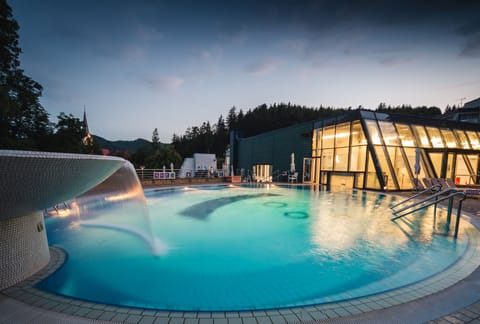 Indoor pool, outdoor pool, pool umbrellas