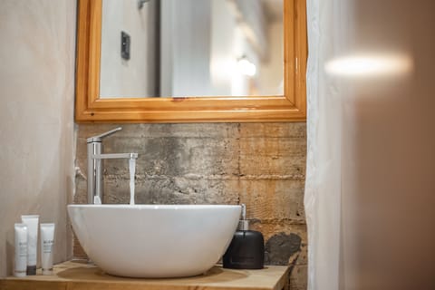 Standard Double Room | Bathroom | Shower, slippers, towels