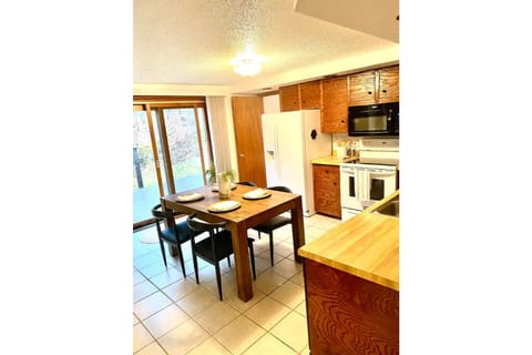 Kitchen with view and access to back deck