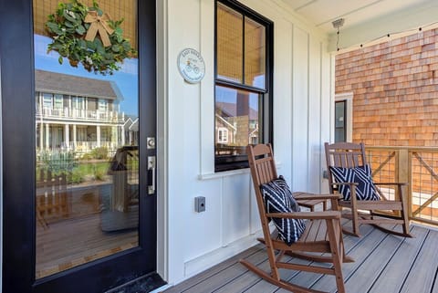 Enjoy morning coffee and watch the kids play out front!