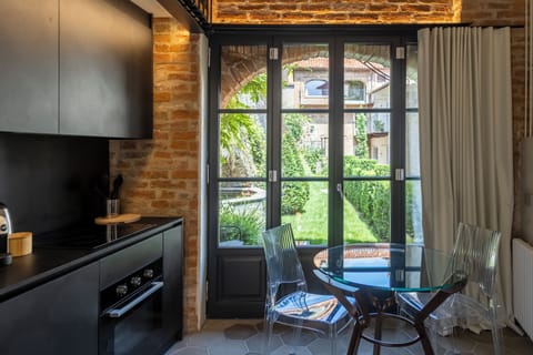 Deluxe Loft, Garden View | Private kitchen | Fridge, dishwasher, espresso maker, coffee/tea maker