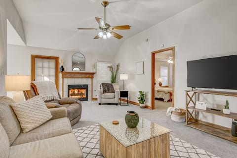 Living area w/ gas fireplace, Roku TV and fully adjustable recliner.