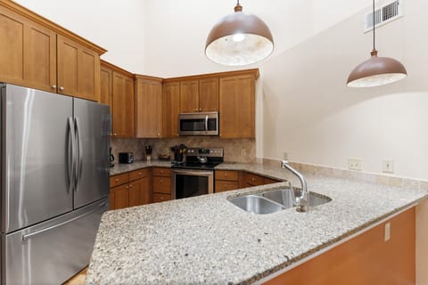 Full, updated kitchen with stainless steel appliances