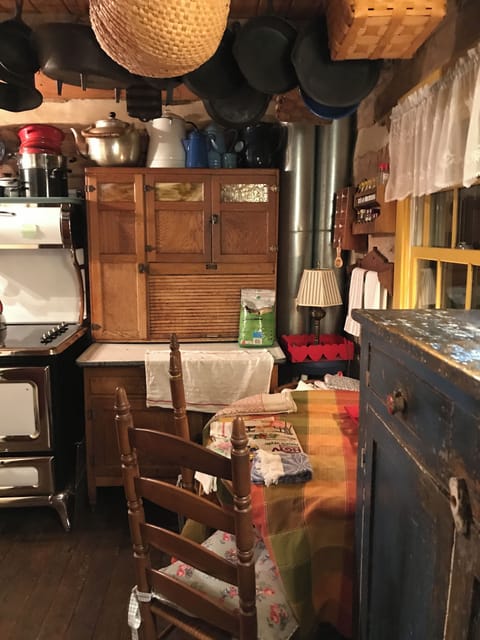 Vintage cabinet holds spices, teas & coffee, small appliances, etc.
