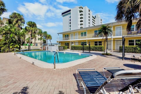Shared pool with lounge chairs