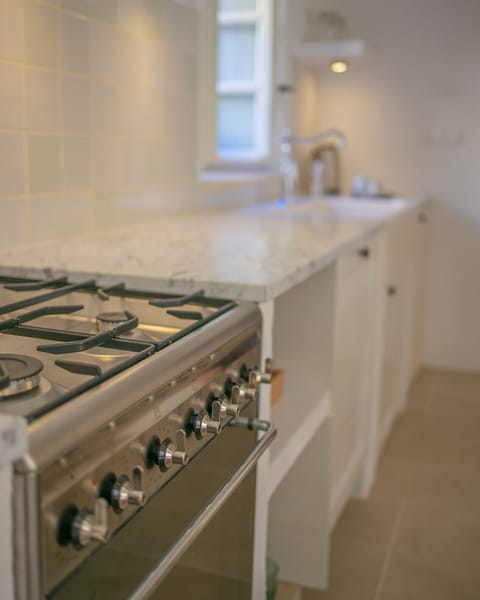 Italian SMEG oven with Carrara marble and oak kitchen