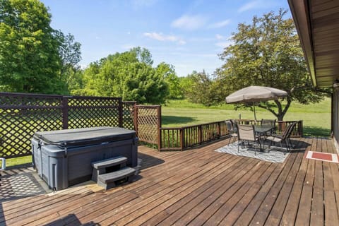 Enjoy the serene beauty of the finger lakes relaxing in the Hot Tub 