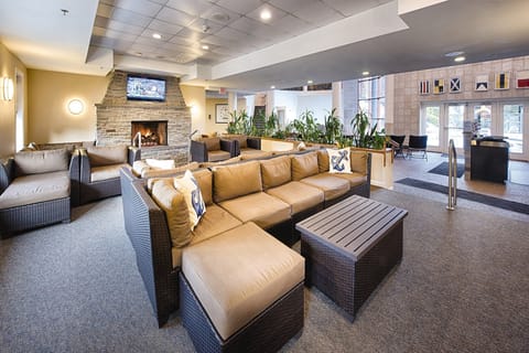 Fireplace seating near the pool, and also to play video games.