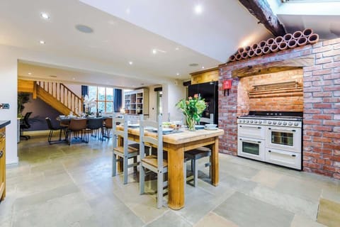 The large kitchen is fully equipped with everything you need for your long or short stay with us. There is a full smeg range cooker, gas hob, American fridge freezer, dishwasher, Nespresso Coffee machine, microwave, toaster, washing machine & dryer.