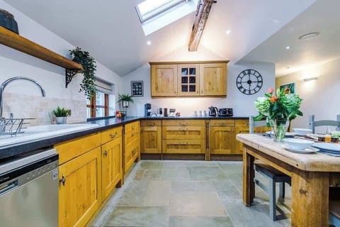 The large kitchen is fully equipped with everything you need for your long or short stay with us. There is a full smeg range cooker, gas hob, American fridge freezer, dishwasher, Nespresso Coffee machine, microwave, toaster, washing machine & dryer.