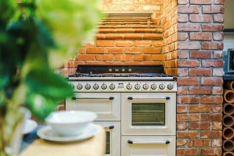 The large kitchen is fully equipped with everything you need for your long or short stay with us. There is a full smeg range cooker, gas hob, American fridge freezer, dishwasher, Nespresso Coffee machine, microwave, toaster, washing machine & dryer.