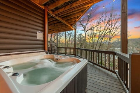 Escape into a realm of tranquility and serenity as you indulge in relaxation with a soothing soak in the hot tub