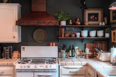 Country home vibes for days.  Cook your meals on the vintage O'Keefe and Merrit