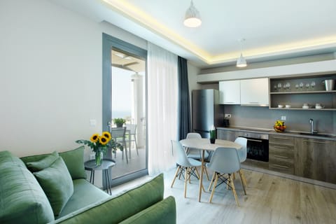 Apartment, 2 Bedrooms, Sea View | Living area | 35-inch TV with digital channels
