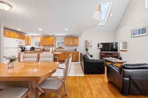 Bright and spacious living room with vaulted ceilings