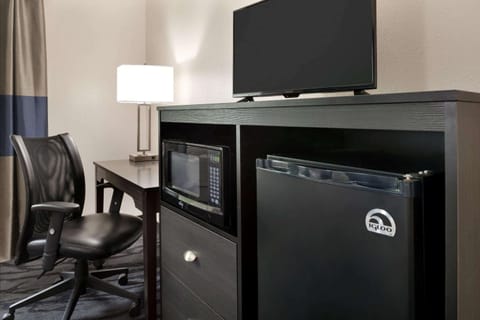 Desk, blackout drapes, iron/ironing board, free cribs/infant beds