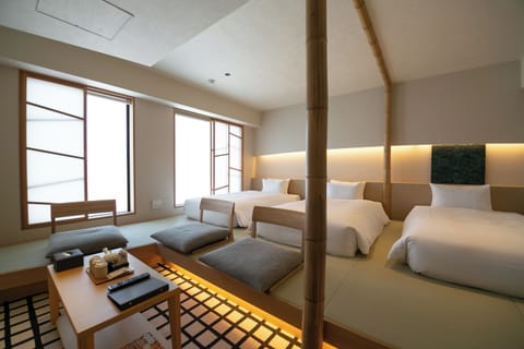 Japanese Triple Room, Non Smoking (Up to 3 pax for above 6 years old) | Down comforters, cribs/infant beds, free WiFi, bed sheets