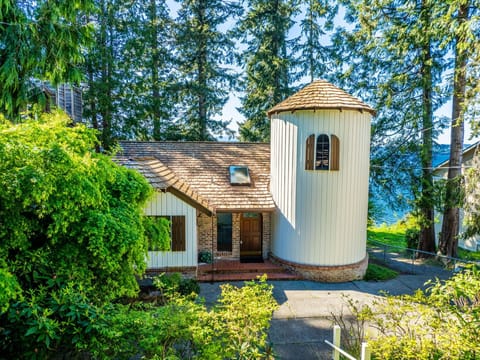 Looking for a unique place to stay? This 2,230-sq ft charming Tudor-style fairyland cottage by the water is the perfect spot for any occasion