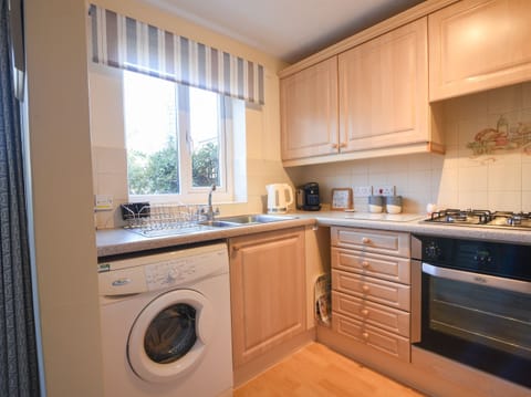 Fridge, electric kettle, toaster, cookware/dishes/utensils