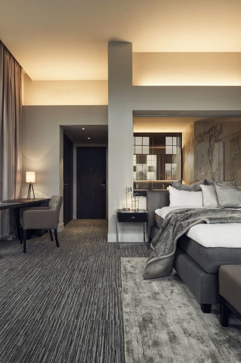 Suite | In-room safe, desk, laptop workspace, soundproofing