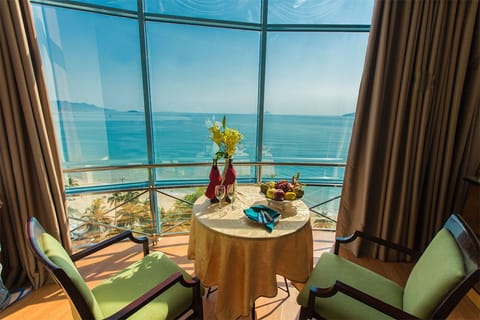 Ocean view Yasaka Suite | Living area | Flat-screen TV