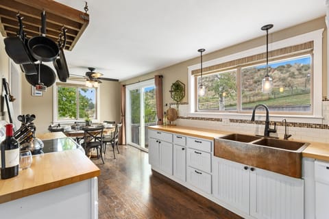 House, Multiple Beds, Patio, Garden View (4928 W. Eisenhower Blvd. Loveland) | Private kitchen | Fridge, microwave, oven, stovetop
