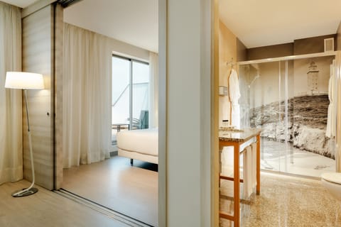 Junior Suite, Terrace | Minibar, in-room safe, individually furnished, desk