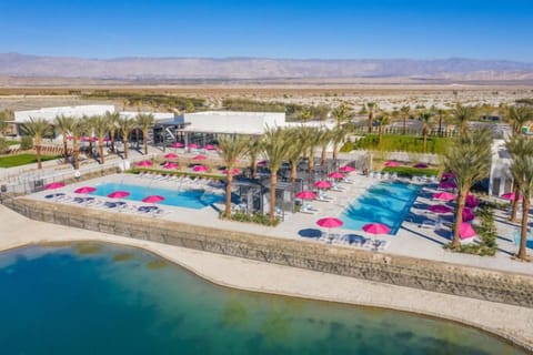 Community pool, workout facilities, and bar.