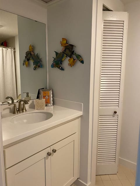 Bathroom with linen closet.