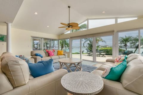 Sunroom overlooking the intercoastal waters, the pool and the patio