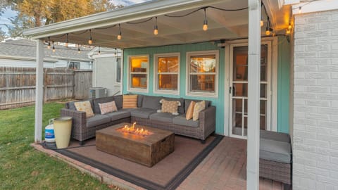 back patio with seating and fire pit