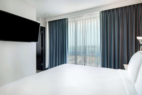 1 King Bed 2 Room Suite | In-room safe, desk, laptop workspace, blackout drapes