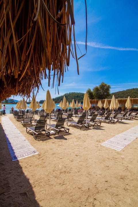 Private beach, sun loungers, beach umbrellas