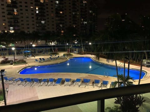 Large outdoor pool area perfect for cooling off, relaxing, or enjoying the sunshine.