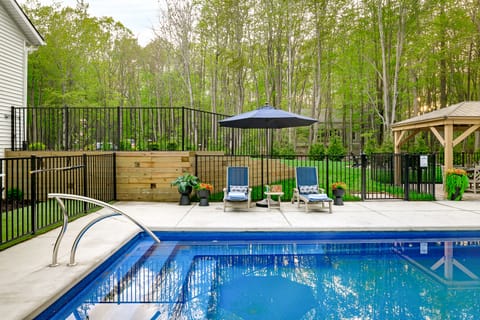Soak in your private heated pool (May–Sept), nestled in peaceful woods, it's your own secluded oasis for sun-soaked family days.