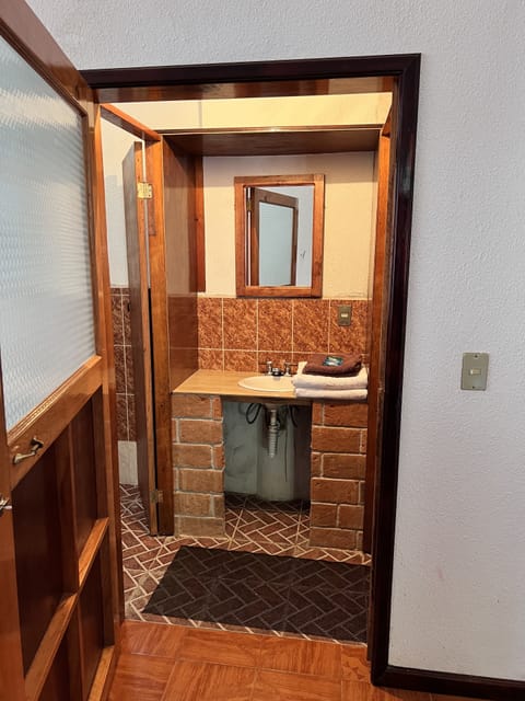 Shower, free toiletries, towels, soap