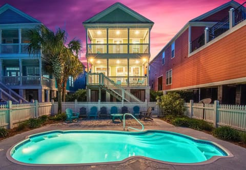 Your Private Surfside Oasis — Just 243 Steps to the Beach! Heated saltwater pool (~90°F year-round) + shaded lounge = your family’s favorite hangout. Skip the crowds, start vacation mode here.