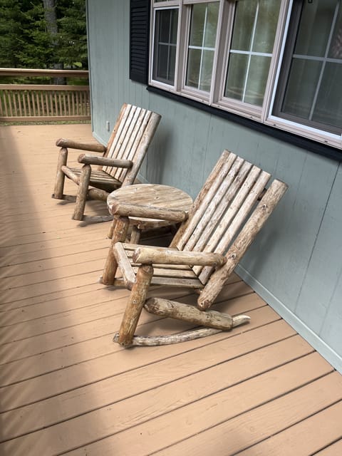 Enjoy a drink on the front porch.  Rocking ADK chairs with table.