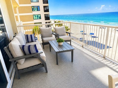 302 Balcony with comfy couch and chairs