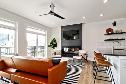 Open concept living, kitchen and dining, flooded with natural light!