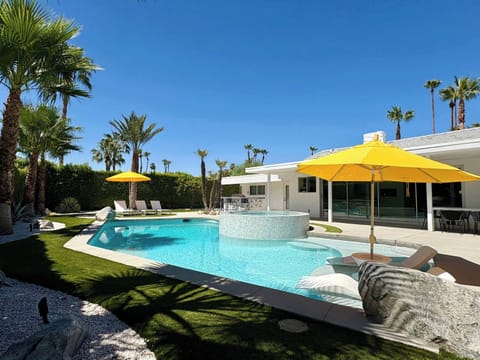 Stunning backyard and state of the art pool and jacuzzi. The pool is 3 feet deep at the shallow end and 7 feet at the deep end. 