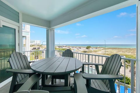 Enjoy alfresco dining while marveling at the breathtaking views from the private balcony.